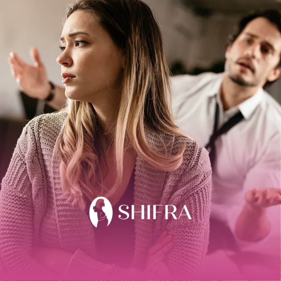 A pregnant Jewish woman turning away during argument with partner, showing relationship strains.